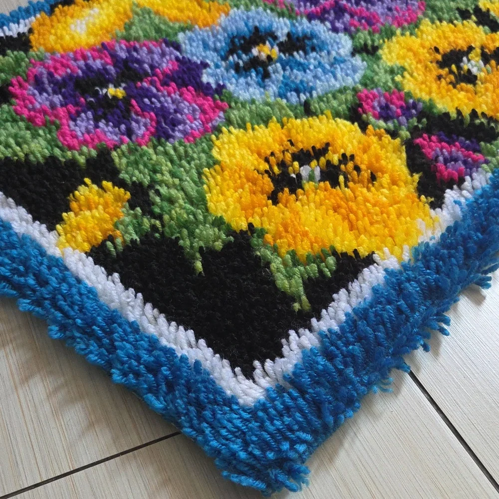 Completed Caron Wonderart Pot of Pansies Rug